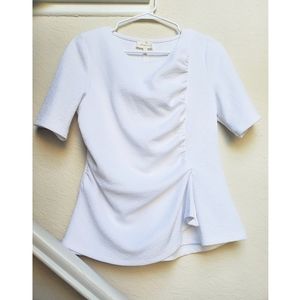 textured peplum style top